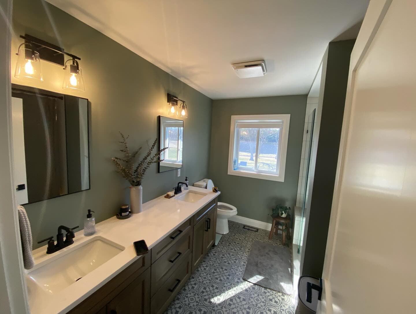 Bathroom painting - sage green walls with modern fixtures